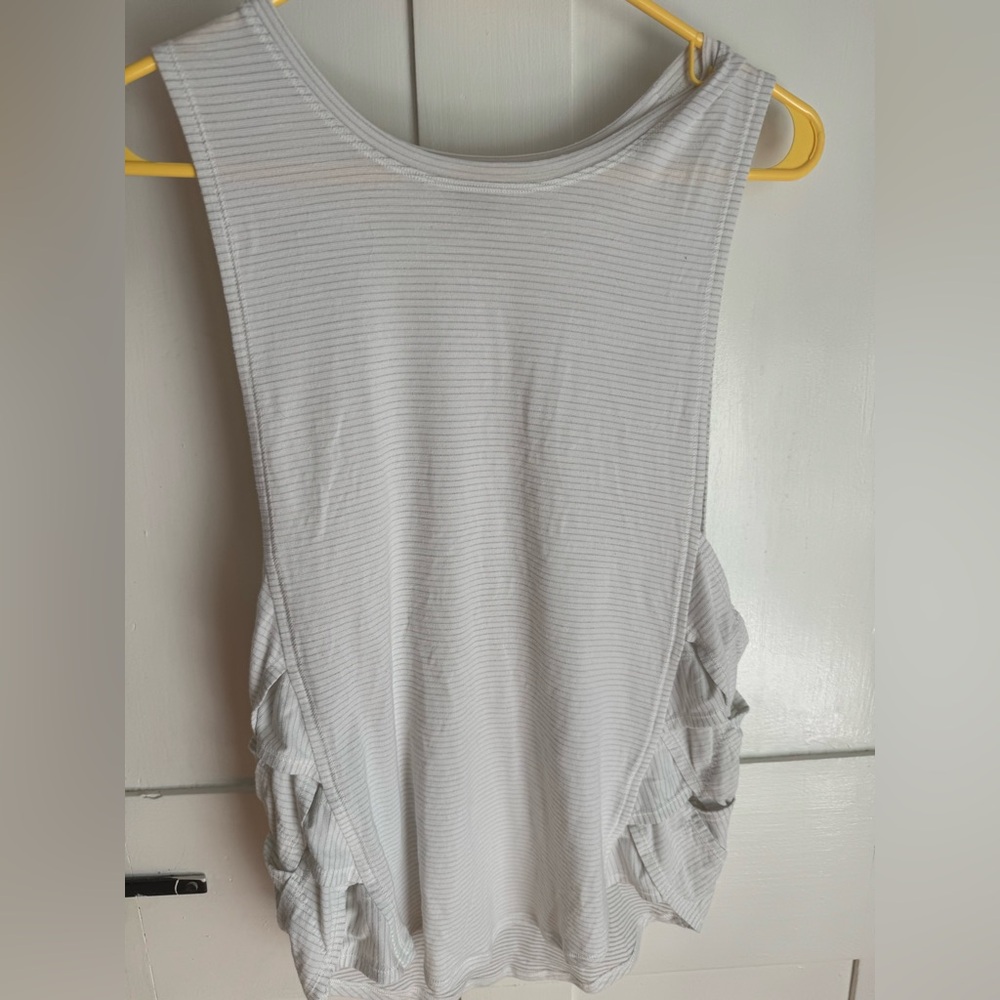 Lululemon Yoga tank. Older style. Cute crisscross design on sides.